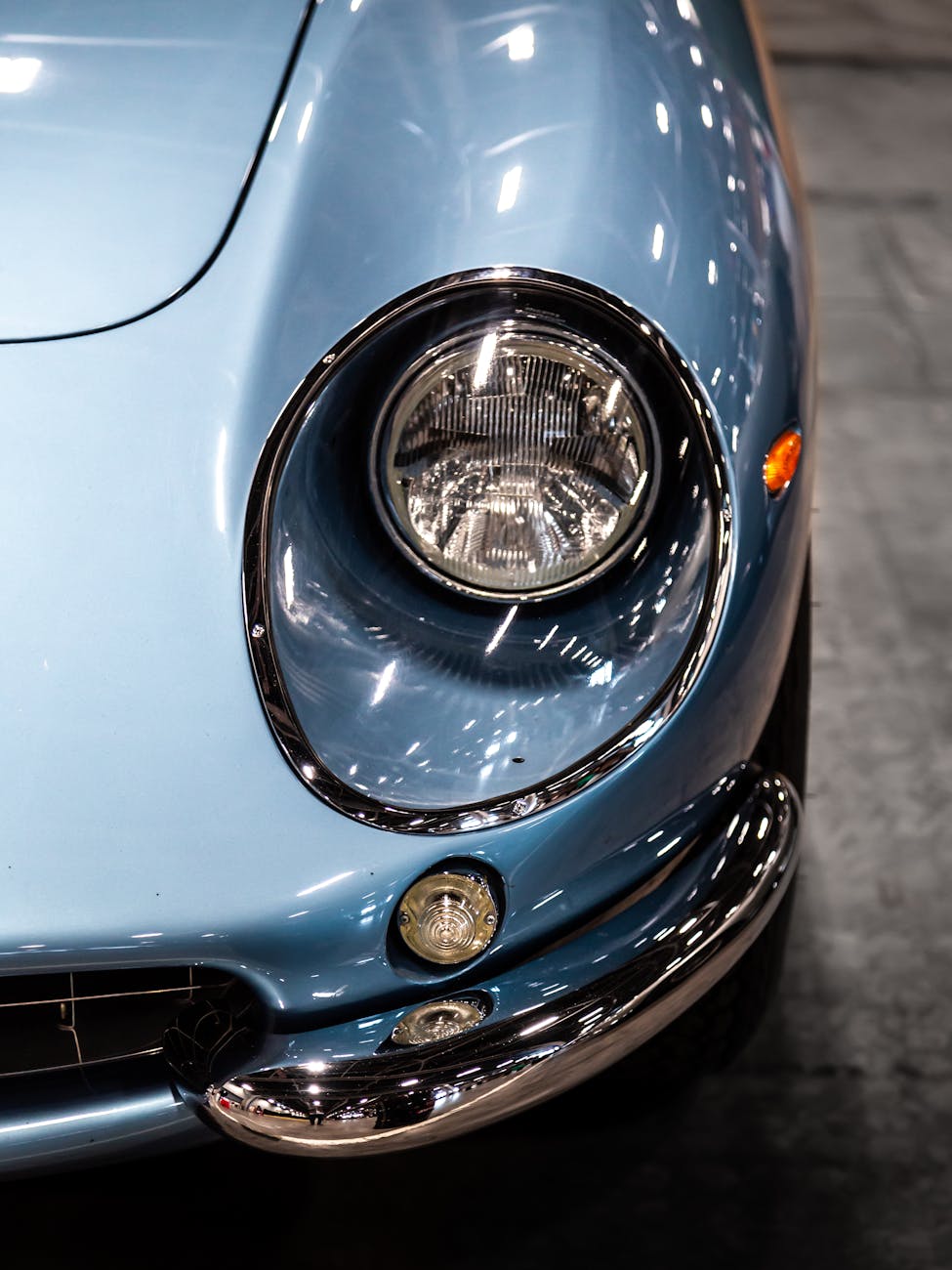 close up of vintage car headlight detailing